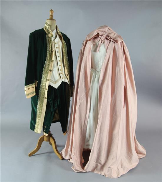 The Marriage of Figaro: A rail of green velvet gold trimmed tail coats and trousers, similar pale blue silver